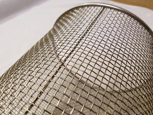 Welded seam in large hole mesh.
